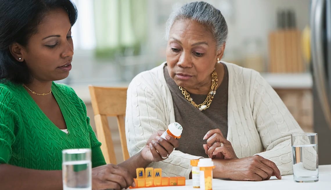 nurse practitioner assisting and explaining medicines to patient under medication management in baltimore, md